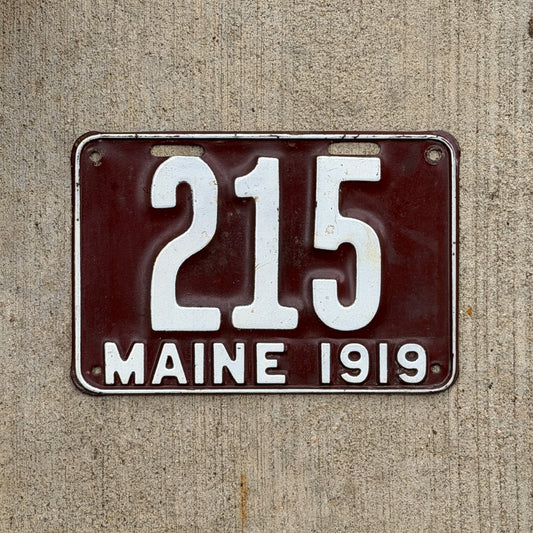 Photo of a 1919 Maine License Plate Auto Tag Garage Decor Vintage Low Number Three Digit 215 with original patina