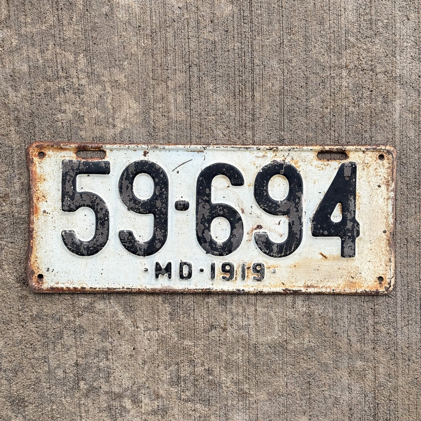 Photo of a 1919 Maryland License Plate Auto Tag Garage Decor Vintage 59 694 with original patina