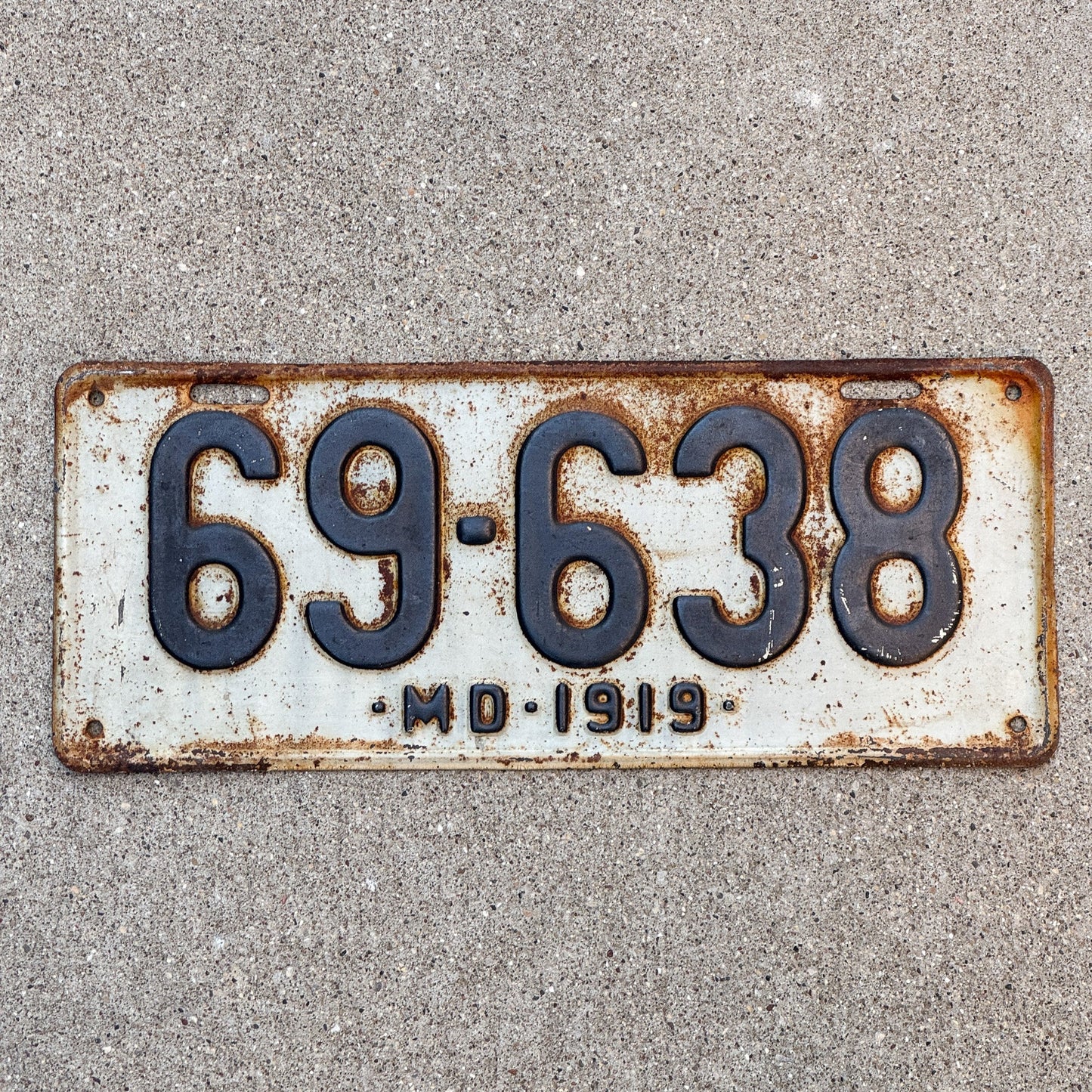 Photo of a 1919 Maryland License Plate Auto Tag Garage Decor Vintage 69 638 with original patina