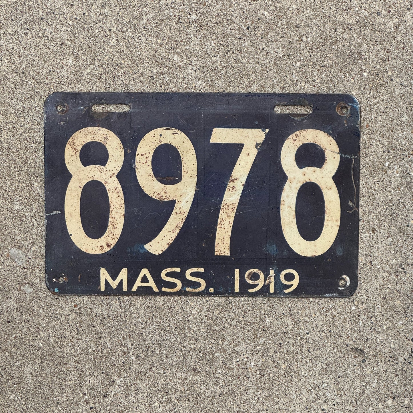 Photo of a 1919 Massachusetts License Plate Auto Tag Garage Decor Vintage Low Number Four Digit 8978 with original patina