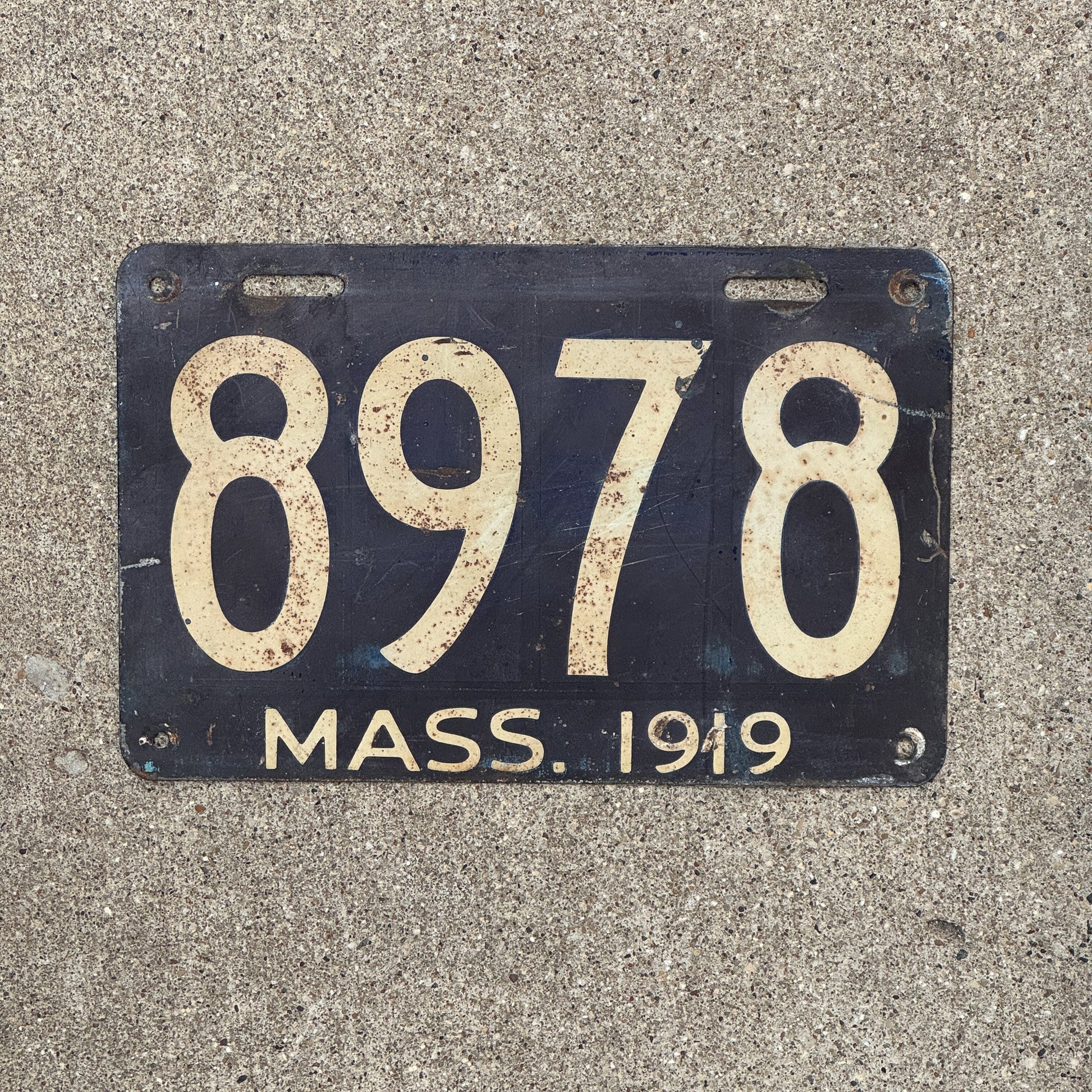 Photo of a 1919 Massachusetts License Plate Auto Tag Garage Decor Vintage Low Number Four Digit 8978 with original patina