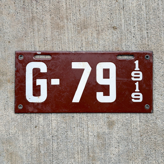 Photo of a 1919 New Hampshire Porcelain Garbage License Plate Auto Tag Garage Decor Vintage High Quality G 79 with original patina