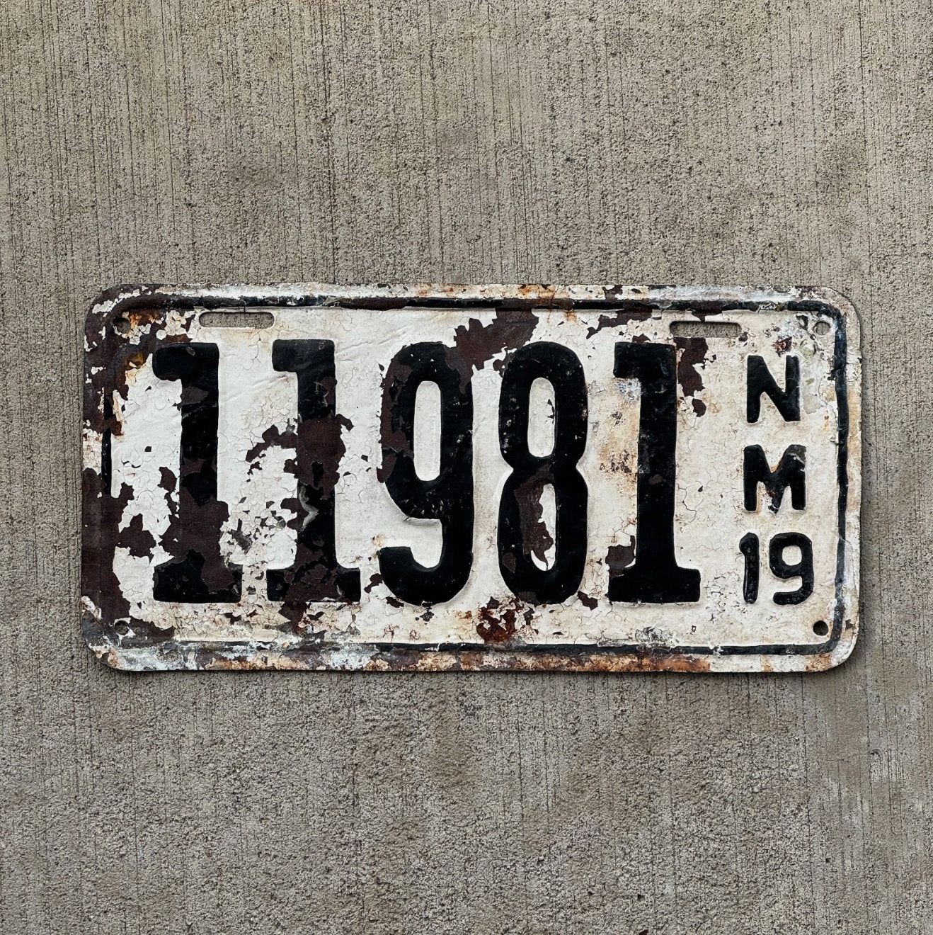 Photo of a 1919 New Mexico License Plate Auto Tag Garage Decor Vintage Pre-porcelain year 11981 with original patina