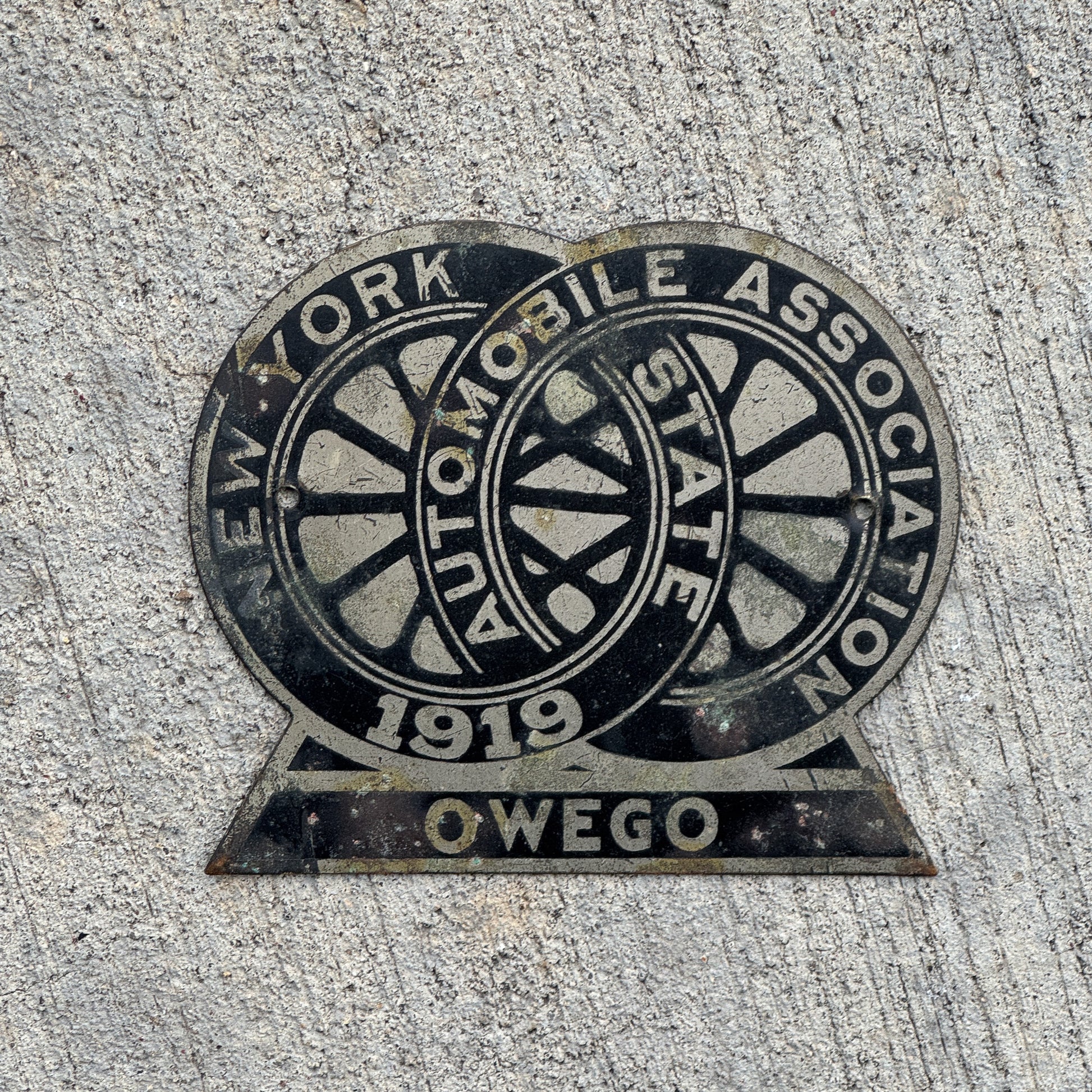 Photo of a 1919 Owego New York Badge Emblem License Plate Topper Auto Tag Garage Decor Vintage with original patina