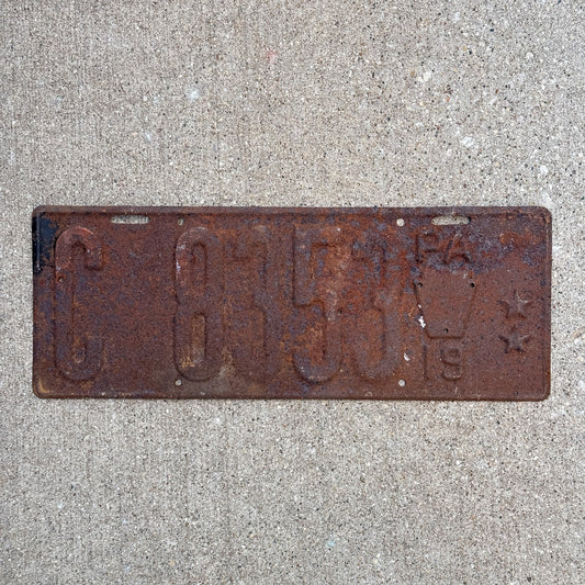 Photo of a 1919 Pennsylvania Truck License Plate Auto Tag Garage Decor Vintage 4000 to 4999 LBS C 8353 with original patina