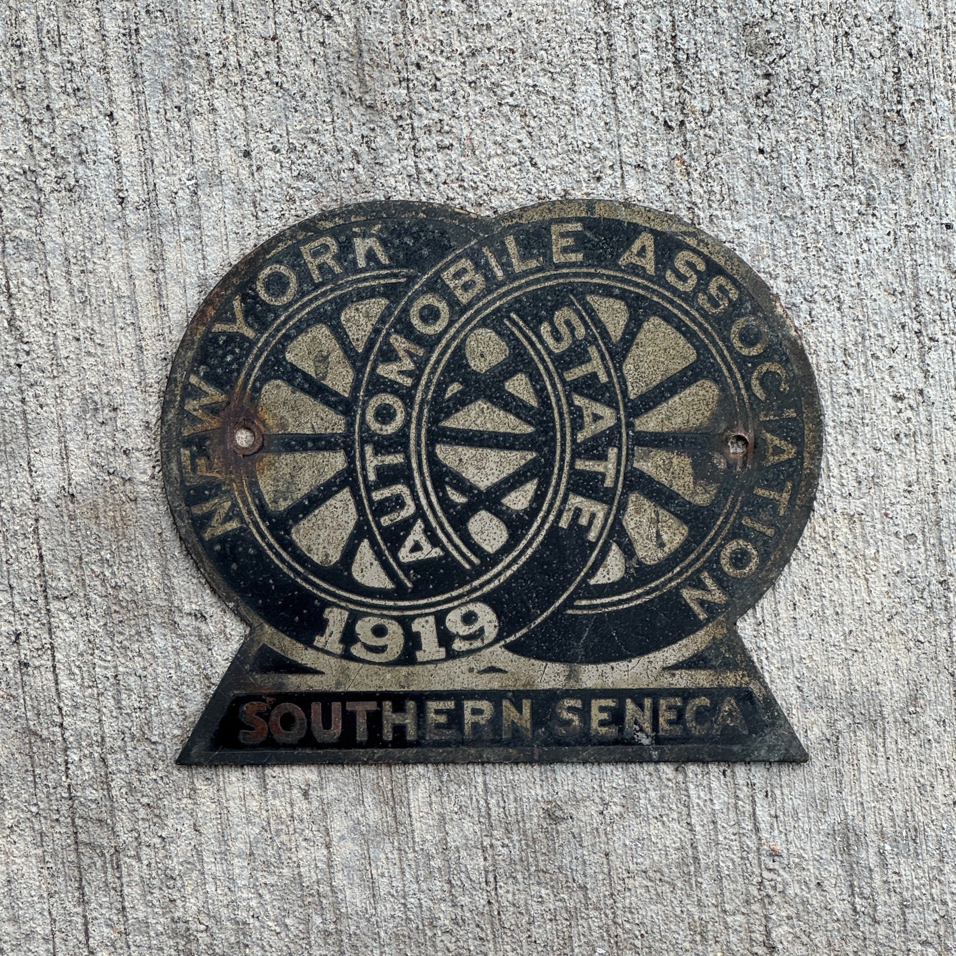 Photo of a 1919 Southern Seneca New York Badge Emblem License Plate Topper Auto Tag Garage Decor Vintage with original patina