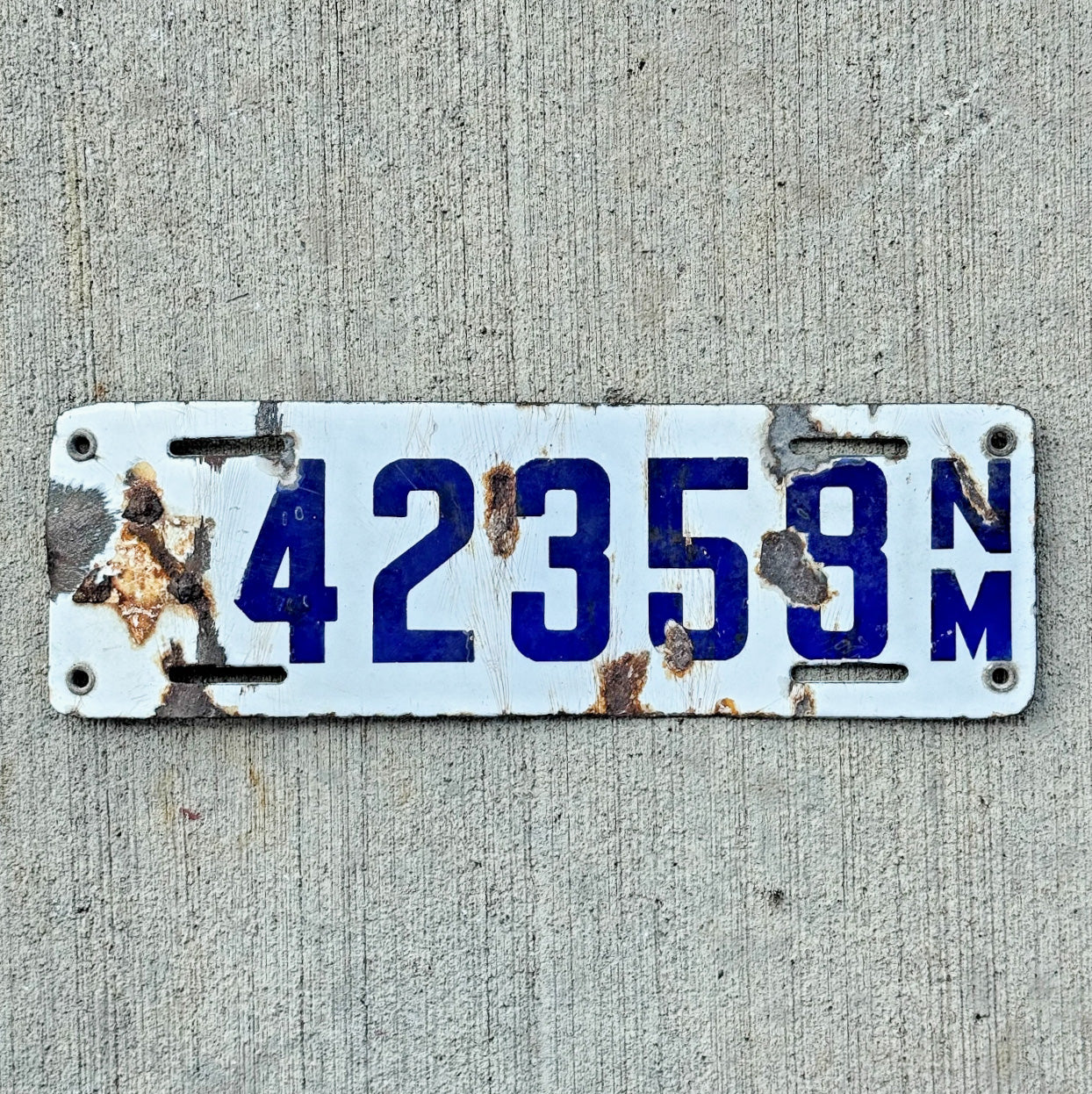 Photo of a 1920 1923 New Mexico Porcelain License Plate Auto Tag Garage Decor Vintage 42358 with original patina