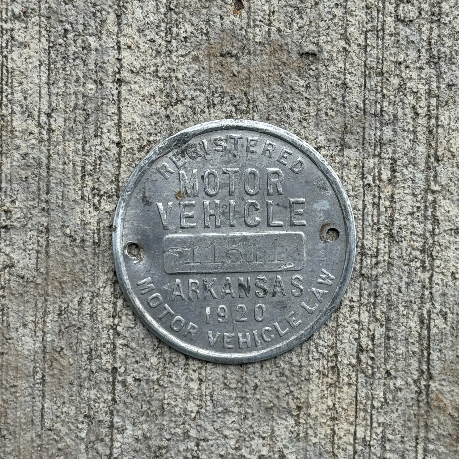 Photo of a 1920 Arkansas Dashboard Disc Auto Tag Garage Decor Vintage Dash Disk 11511 with original patina