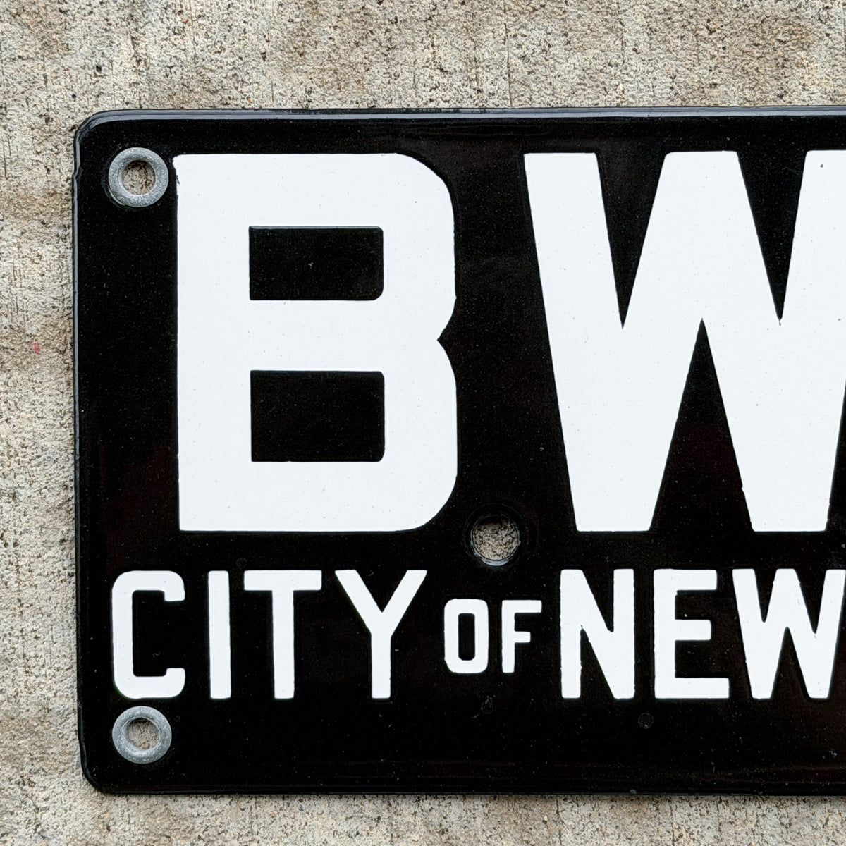 Photo of a 1920 Era New York Porcelain License Plate Auto Tag Garage Decor Vintage New York City Bureau of Water Supply BWS with original patina