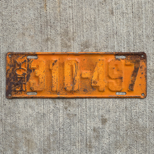 Photo of a 1920 Michigan License Plate Auto Tag Garage Decor Vintage 310 497 with original patina