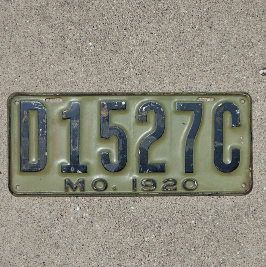 Photo of a 1920 Missouri Dealer License Plate Auto Tag Garage Decor Vintage D 1527 C with original patina