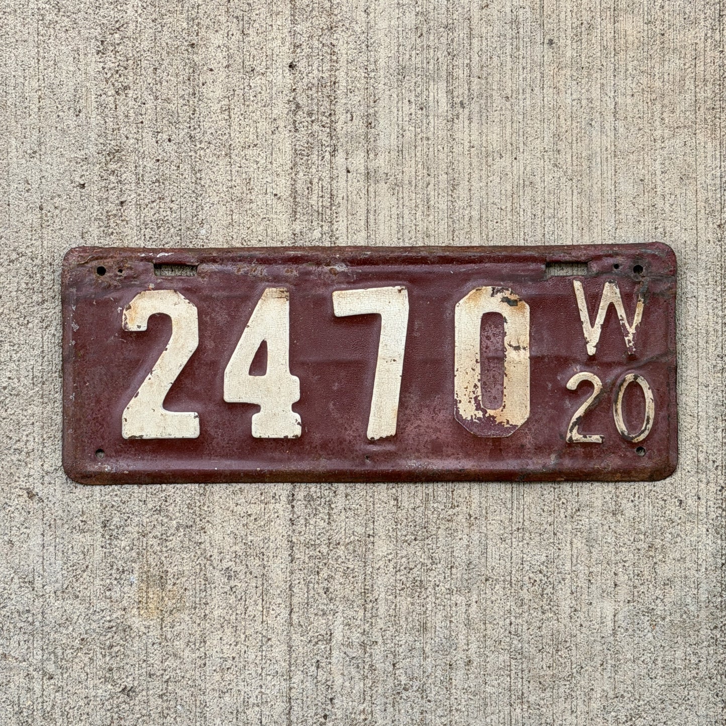 Photo of a 1920 Wisconsin License Plate Auto Tag Garage Decor Vintage Low Number Four Digit 2470 with original patina