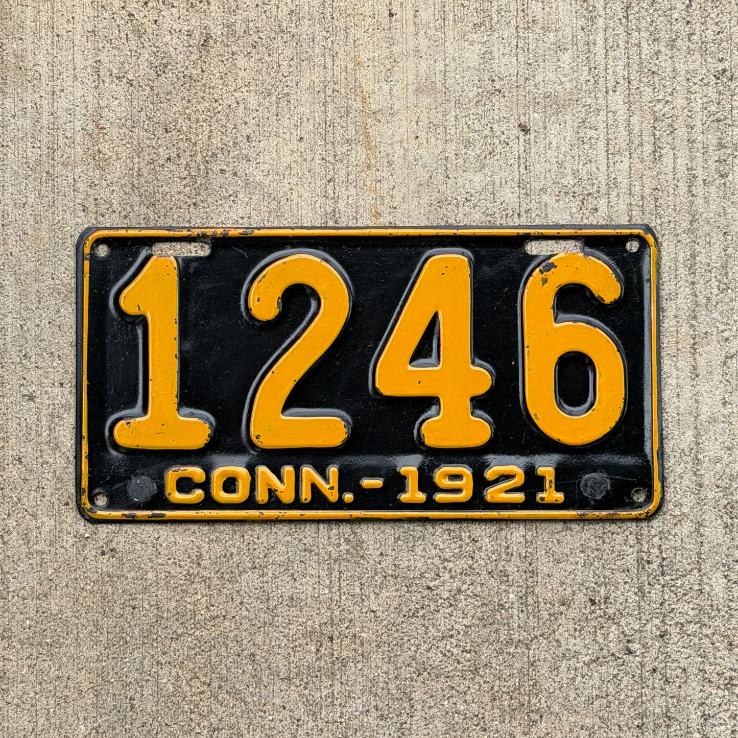 Photo of a 1921 Connecticut License Plate Auto Tag Garage Decor Vintage Low Number Four Digit 1246 with original patina