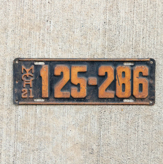 Photo of a 1921 Michigan License Plate Auto Tag Garage Decor Vintage 125 286 with original patina
