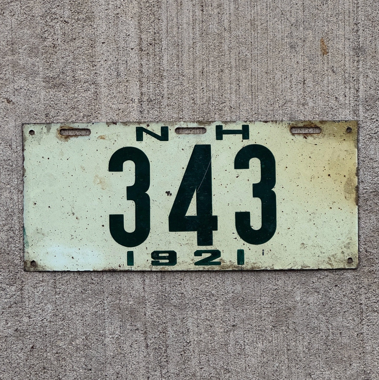 Photo of a 1921 New Hampshire License Plate Auto Tag Garage Decor Vintage Low Number Three Digit 343 with original patina