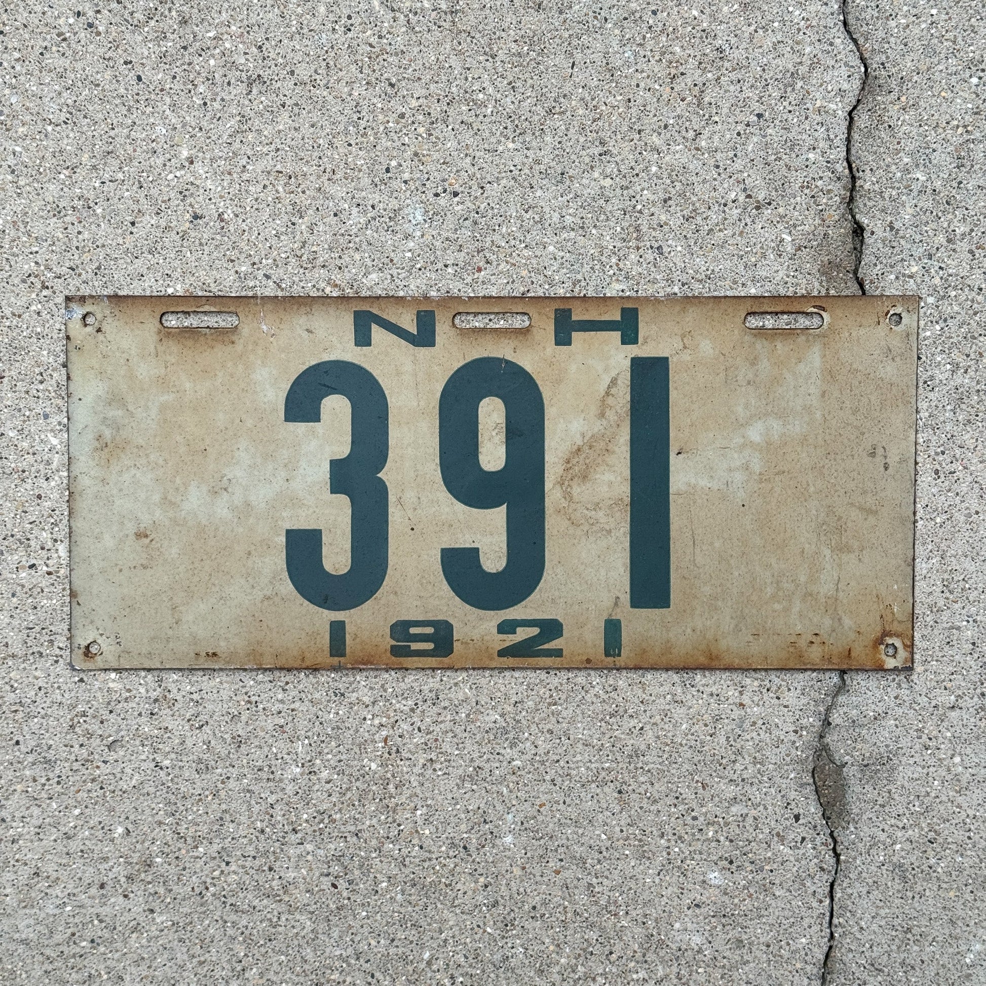 Photo of a 1921 New Hampshire License Plate Auto Tag Garage Decor Vintage Low Number Three Digit 391 with original patina