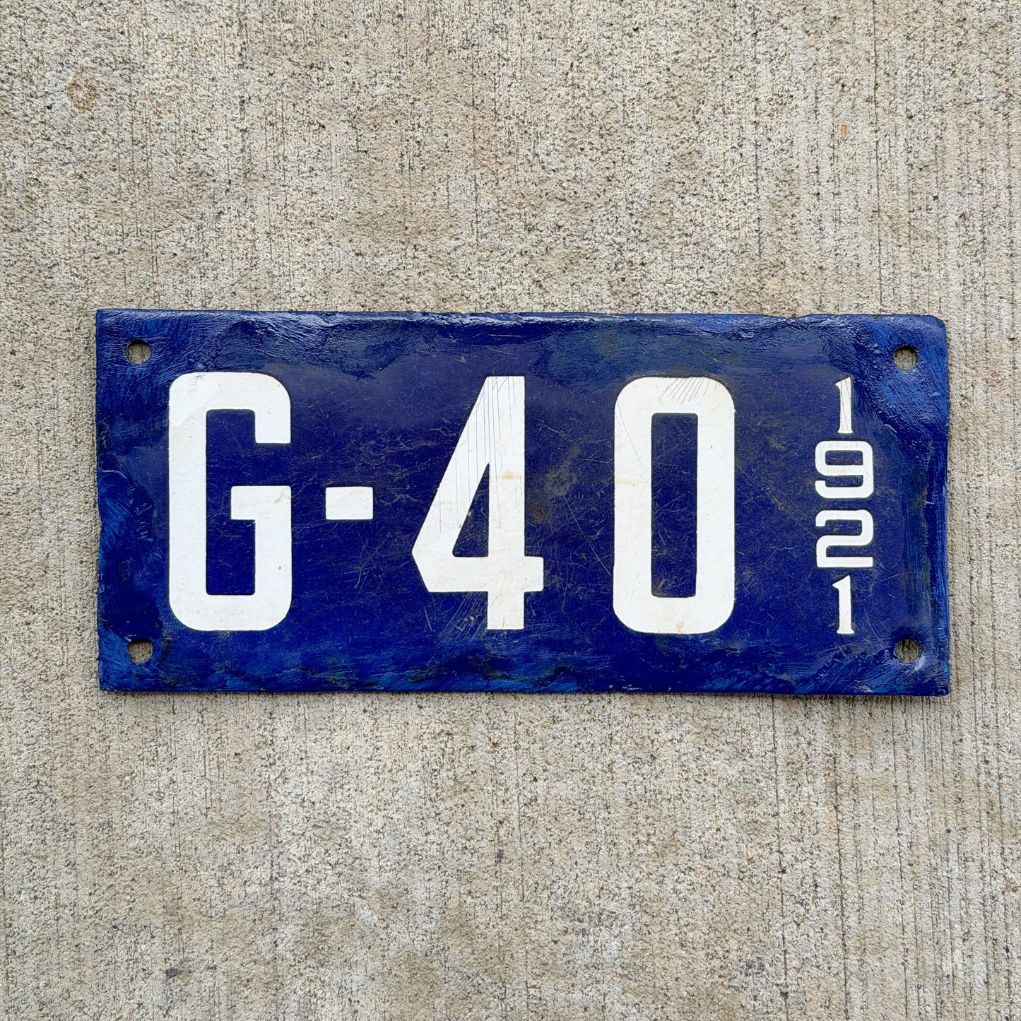 Photo of a 1921 New Hampshire Porcelain Garbage License Plate Auto Tag Garage Decor Vintage G 40 with original patina