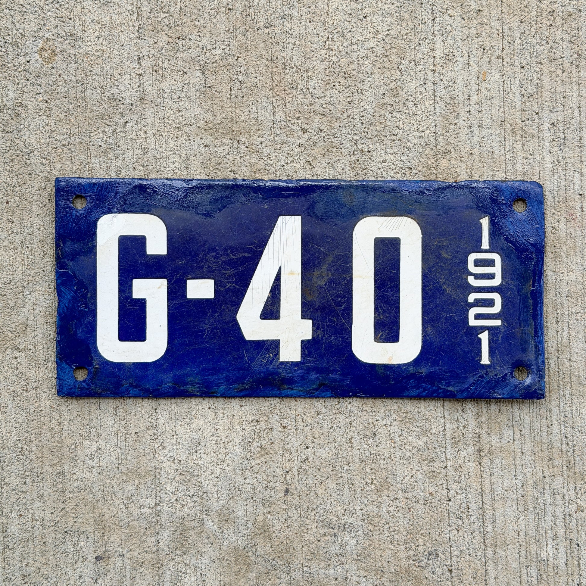 Photo of a 1921 New Hampshire Porcelain Garbage License Plate Auto Tag Garage Decor Vintage G 40 with original patina