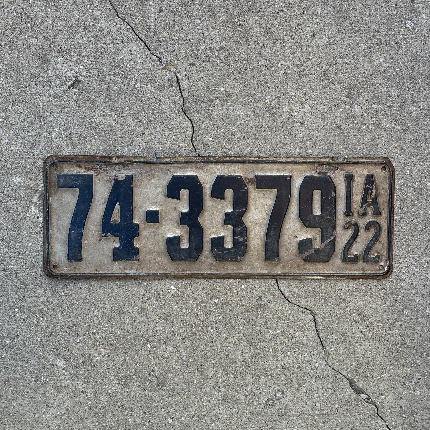 Photo of a 1922 Iowa License Plate Auto Tag Garage Decor Vintage 74 3379 with original patina