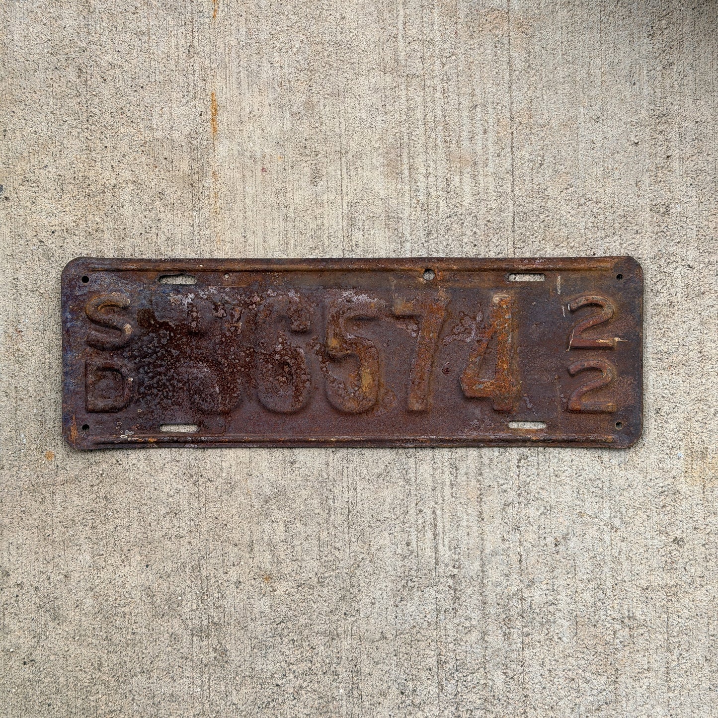 Photo of a 1922 South Dakota License Plate Auto Tag Garage Decor Vintage 36574 with original patina