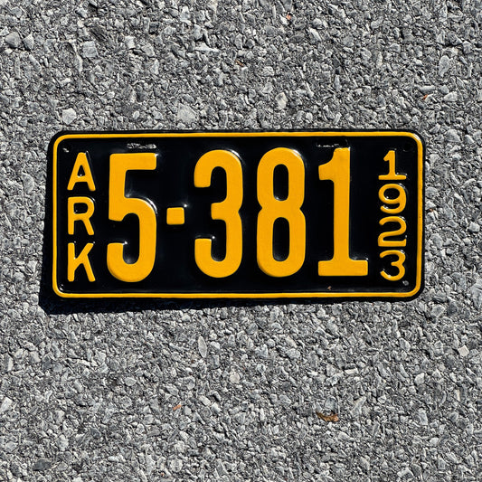 Photo of a 1923 Arkansas License Plate Auto Tag Garage Decor Vintage Four Digit Low Number 5381