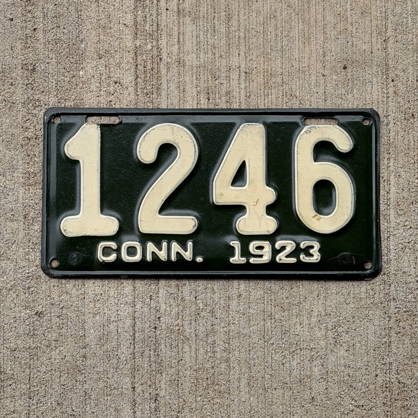 Photo of a 1923 Connecticut License Plate Auto Tag Garage Decor Vintage Low Number Four Digit 1246 with original patina