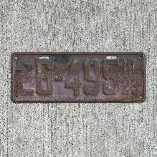 Photo of a 1923 Illinois License Plate Auto Tag Garage Decor Vintage 26 495 with original patina