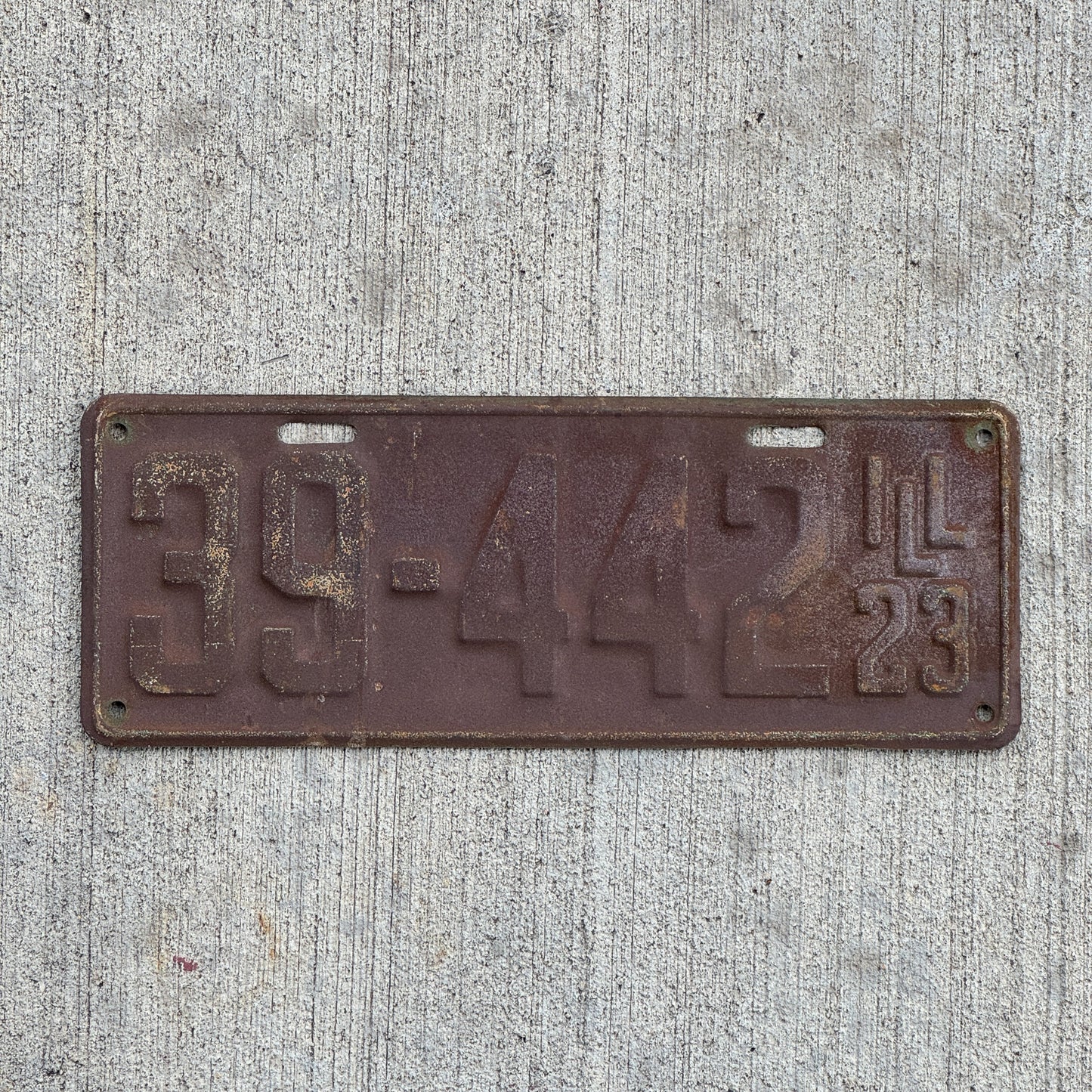Photo of a 1923 Illinois License Plate Auto Tag Garage Decor Vintage 39 442 with original patina