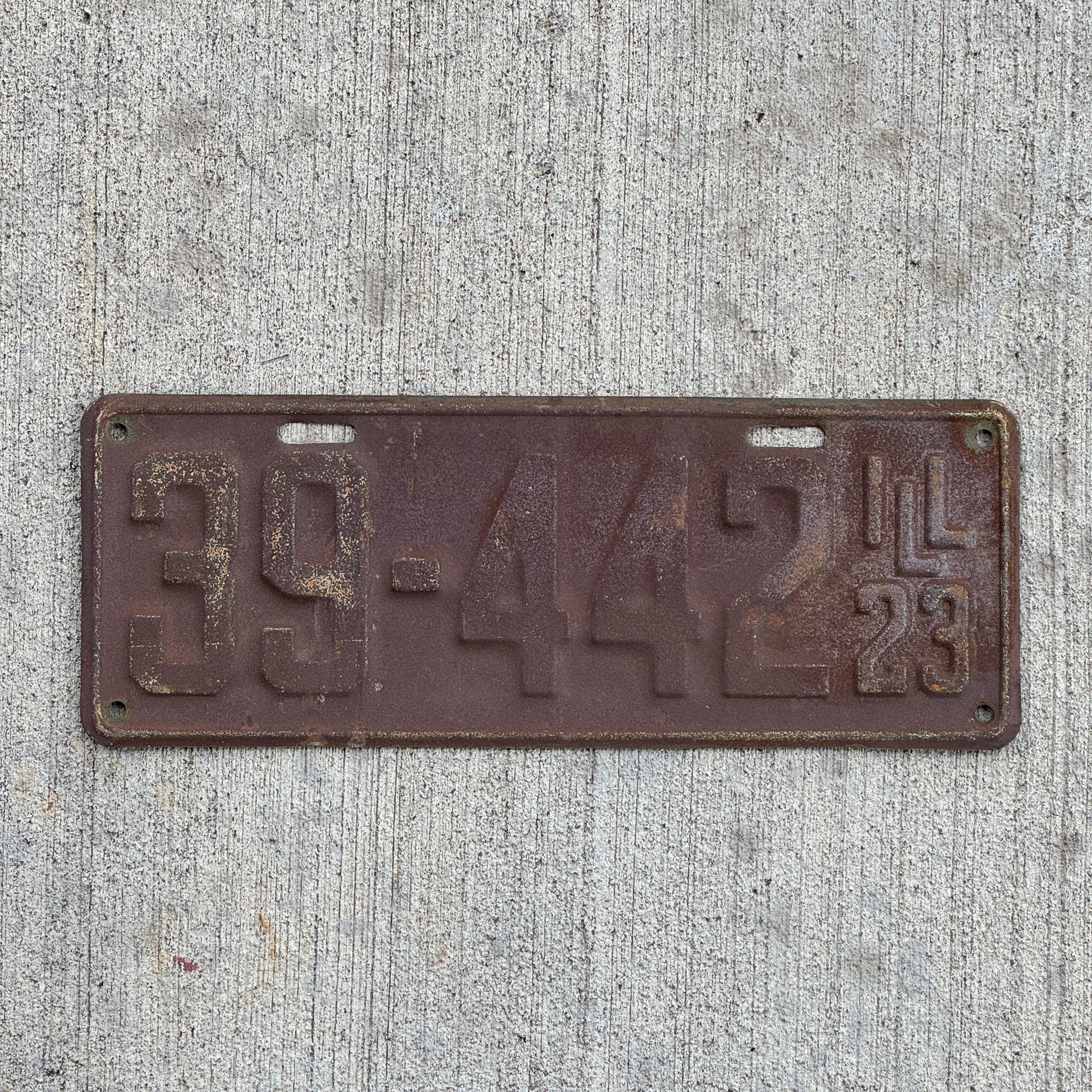 Photo of a 1923 Illinois License Plate Auto Tag Garage Decor Vintage 39 442 with original patina