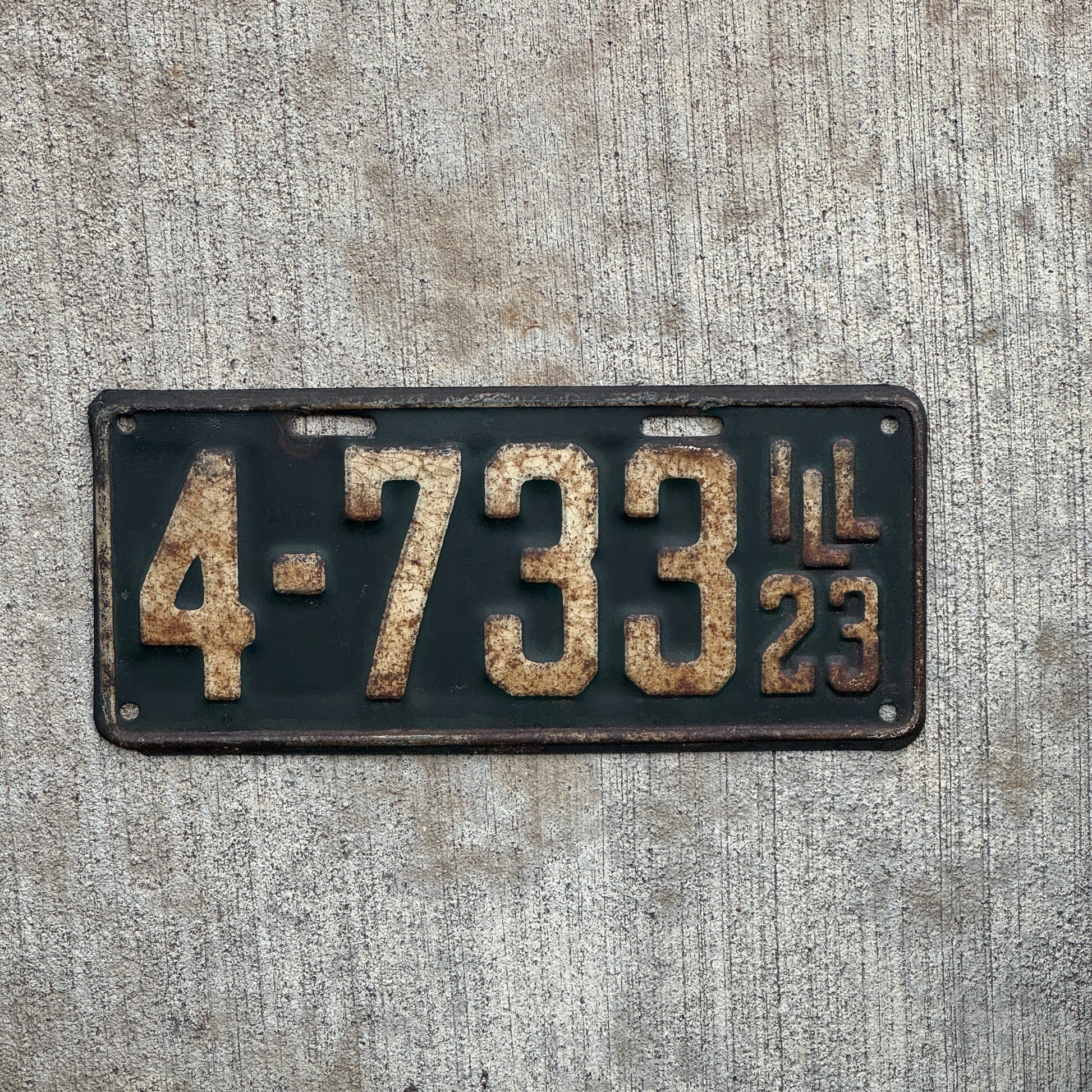 Photo of a 1923 Illinois License Plate Auto Tag Garage Decor Vintage Low Number Four Digit 4733 with original patina