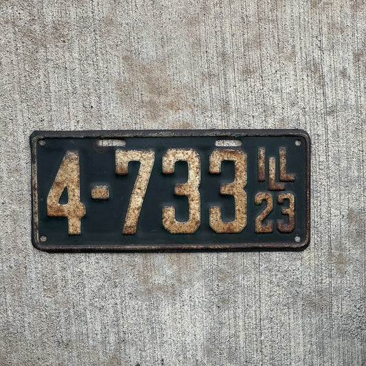 Photo of a 1923 Illinois License Plate Auto Tag Garage Decor Vintage Low Number Four Digit 4733 with original patina