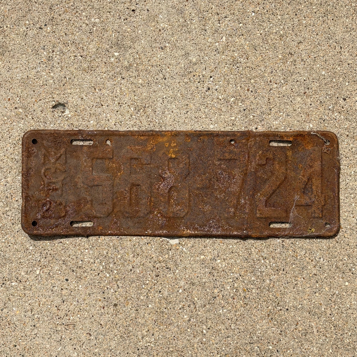 Photo of a 1923 Michigan License Plate Auto Tag Garage Decor Vintage 568 724 with original patina