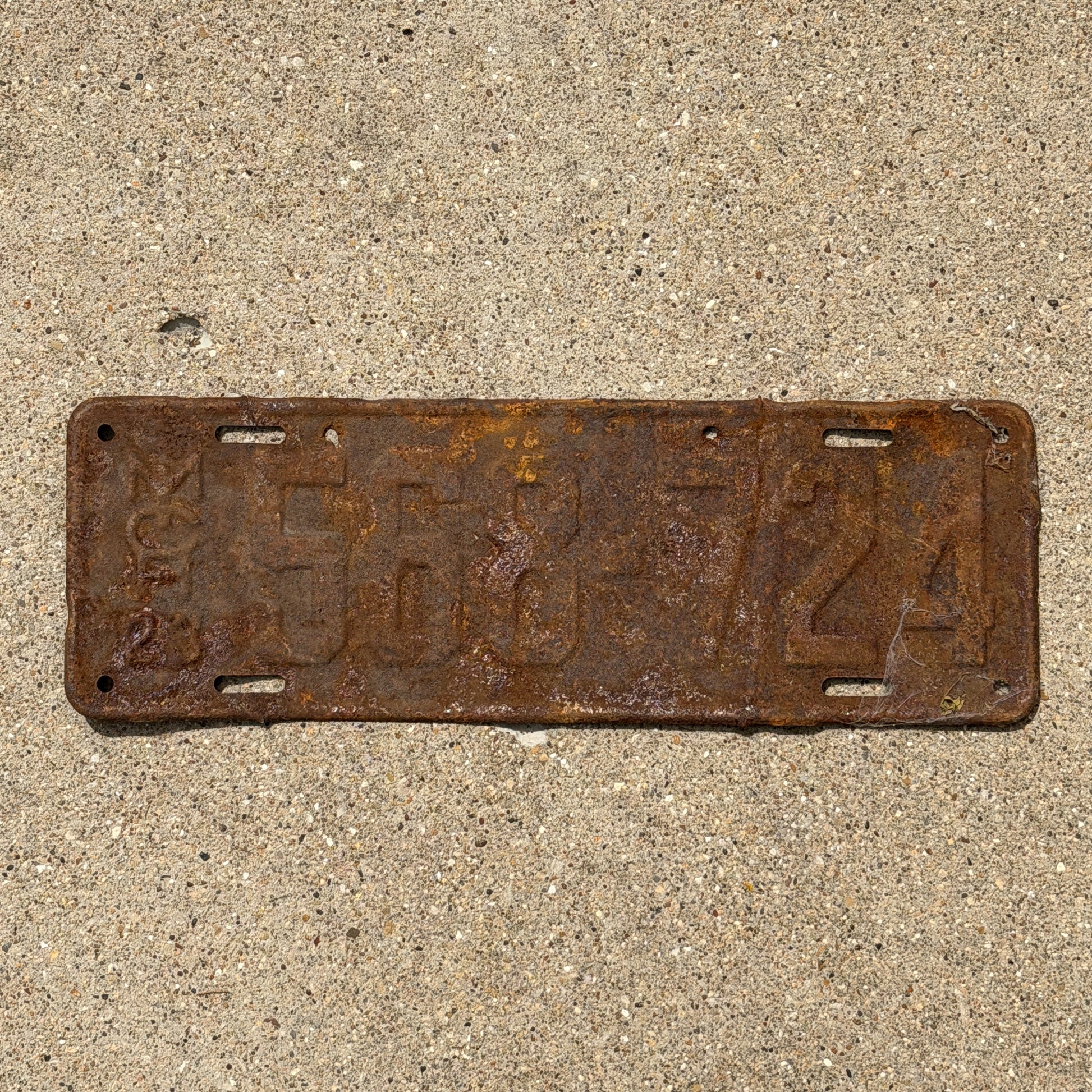 Photo of a 1923 Michigan License Plate Auto Tag Garage Decor Vintage 568 724 with original patina