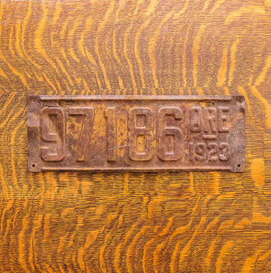 Photo of a 1923 Oregon License Plate Auto Tag Garage Decor Vintage 97 186 with original patina