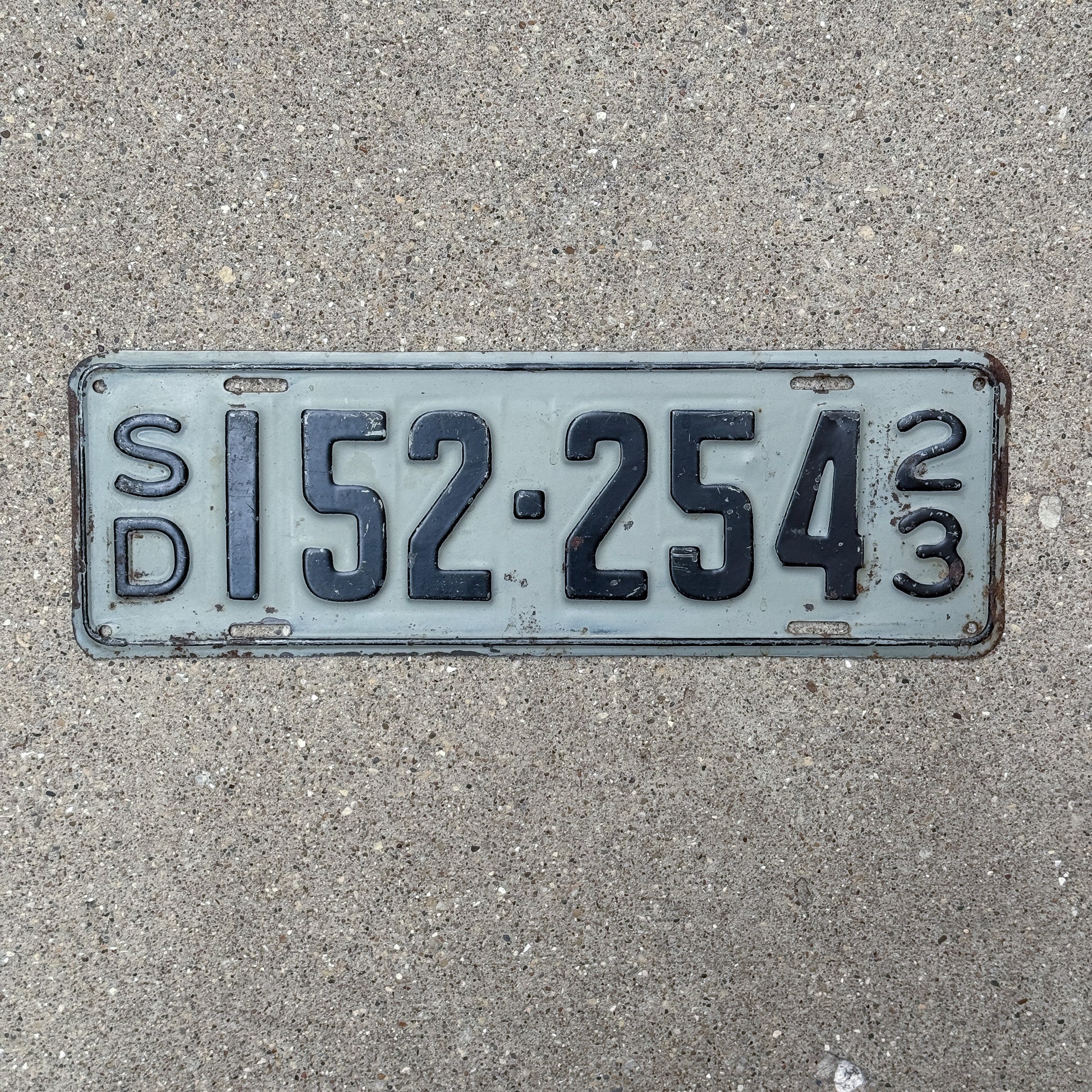 Photo of a 1923 South Dakota License Plate Auto Tag Garage Decor Vintage 152 254 with original patina