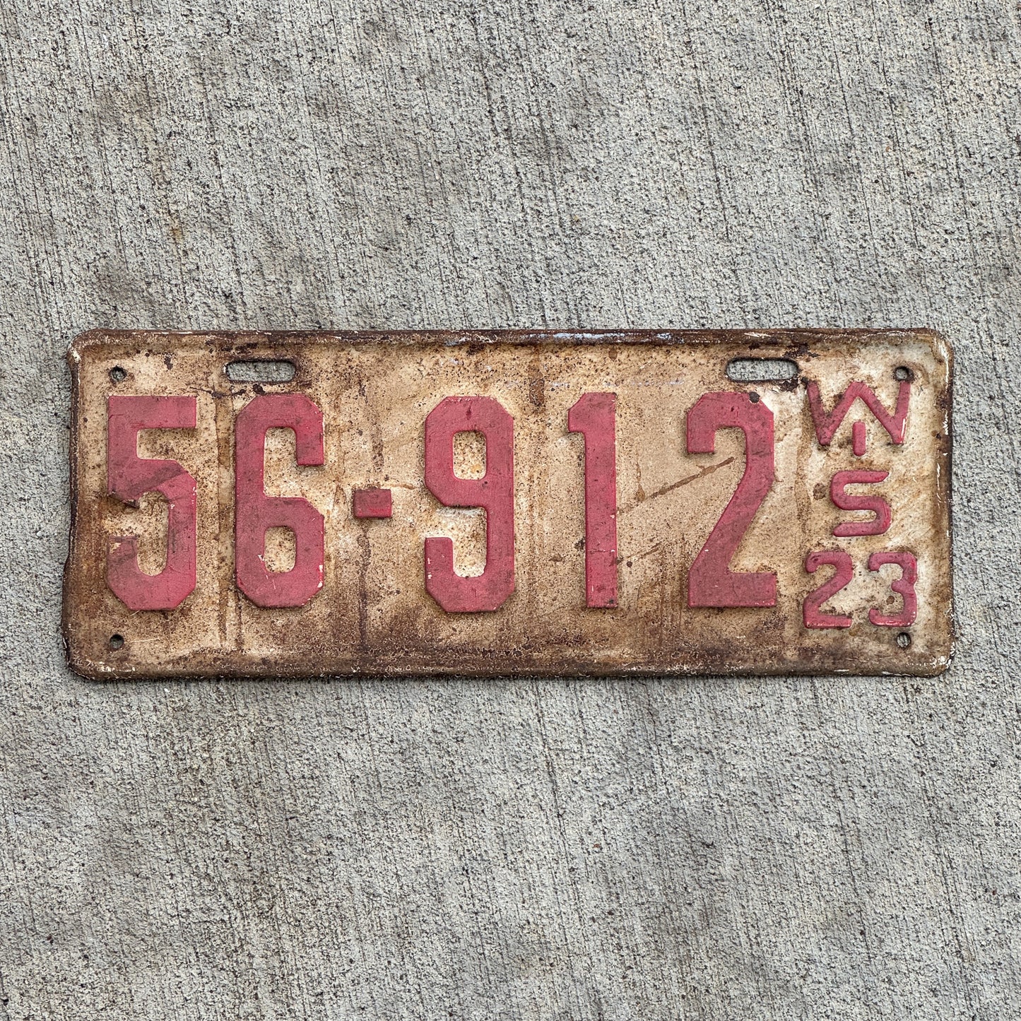 Photo of a 1923 Wisconsin License Plate Auto Tag Garage Decor Vintage 56 912 with original patina