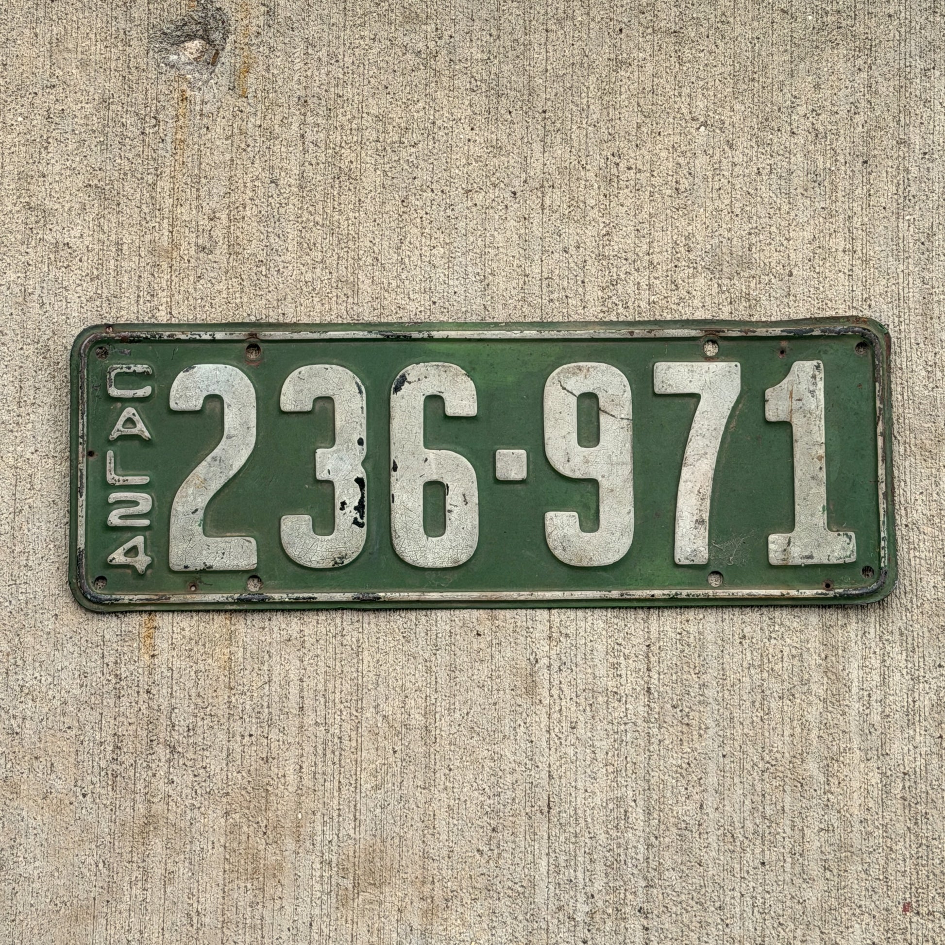 Photo of a 1924 California License Plate Auto Tag Garage Decor Vintage 236 971 with original patina