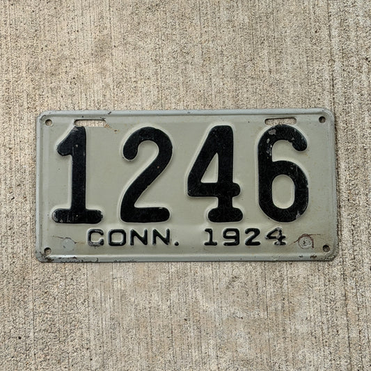 Photo of a 1924 Connecticut License Plate Auto Tag Garage Decor Vintage Low Number Four Digit 1246 with original patina