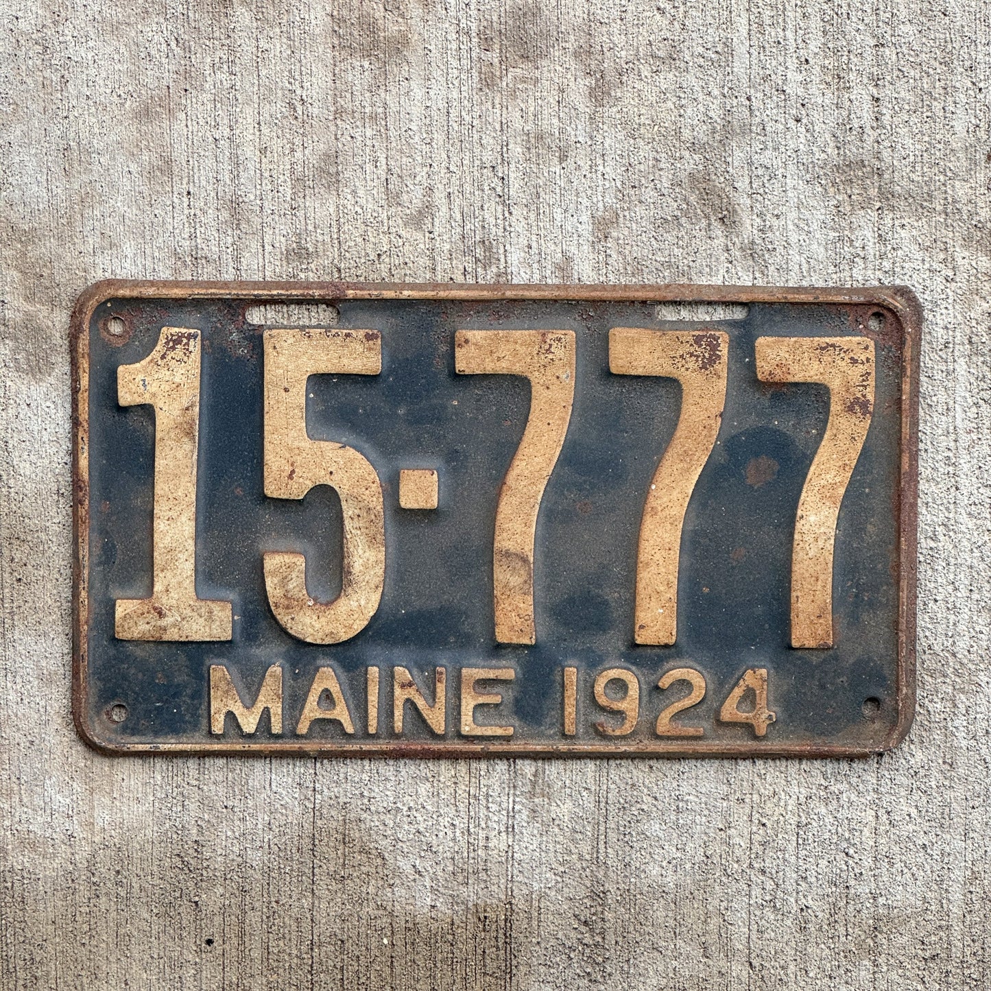Photo of a 1924 Maine License Plate Auto Tag 2 Vintage Garage Lucky 7s Repeat Repeating 15 777 with original patina
