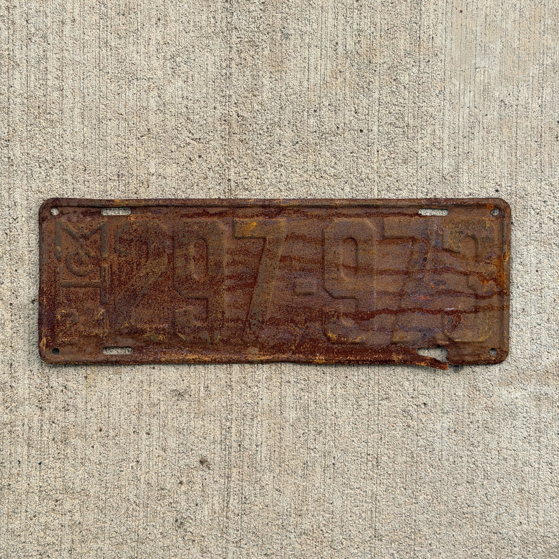 Photo of a 1924 Michigan License Plate Auto Tag Garage Decor Vintage 297 973 with original patina