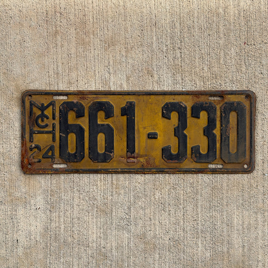 Photo of a 1924 Michigan License Plate Auto Tag Garage Decor Vintage 661 330 with original patina