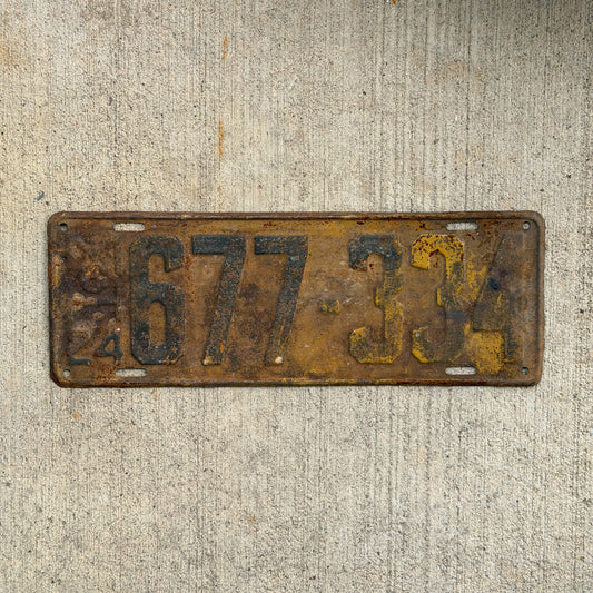 Photo of a 1924 Michigan License Plate Auto Tag Garage Decor Vintage 677 334 with original patina