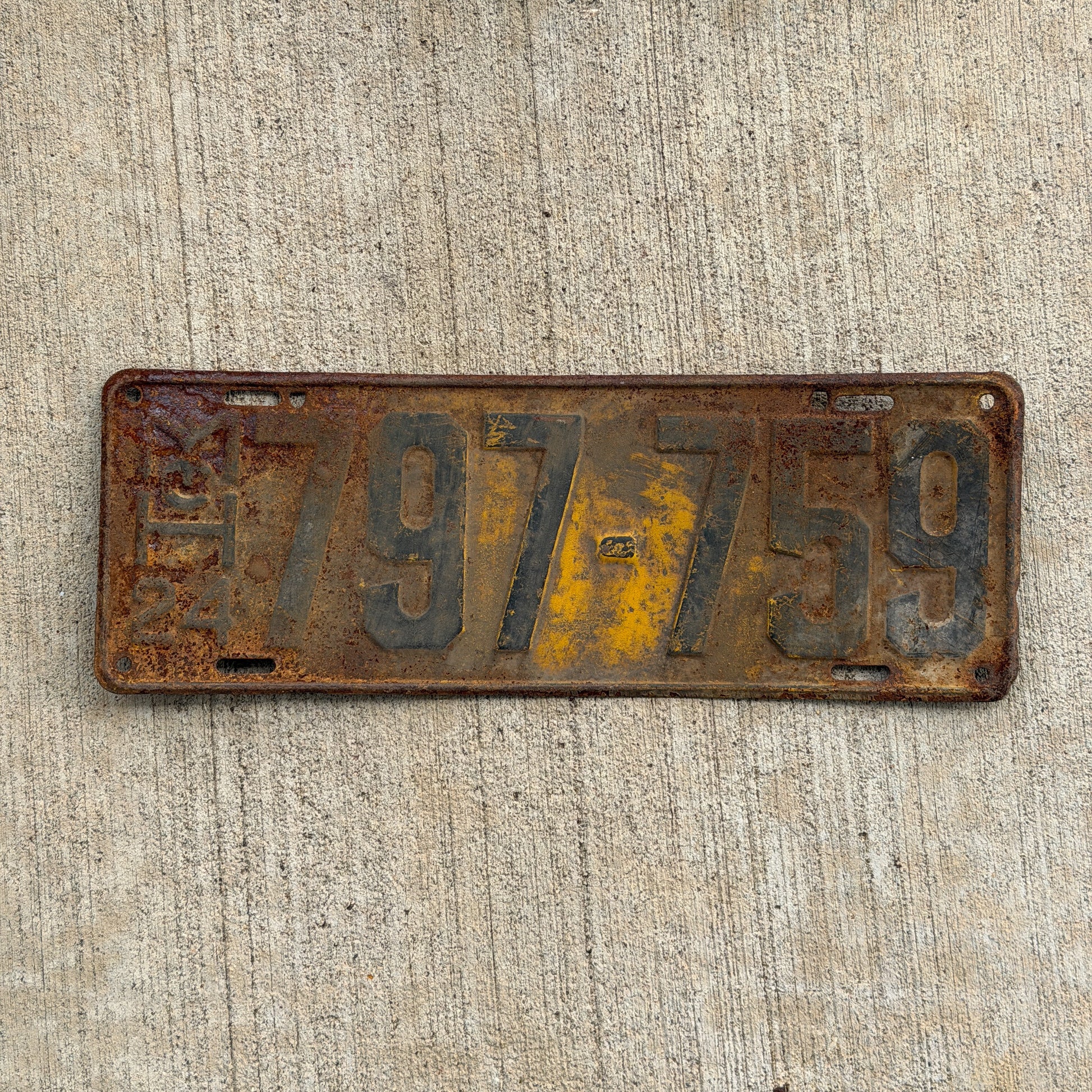 Photo of a 1924 Michigan License Plate Auto Tag Garage Decor Vintage 797 759 with original patina