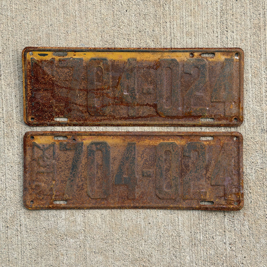 Photo of a 1924 Michigan License Plate Pair Auto Tag Garage Decor Vintage 704 024 with original patina