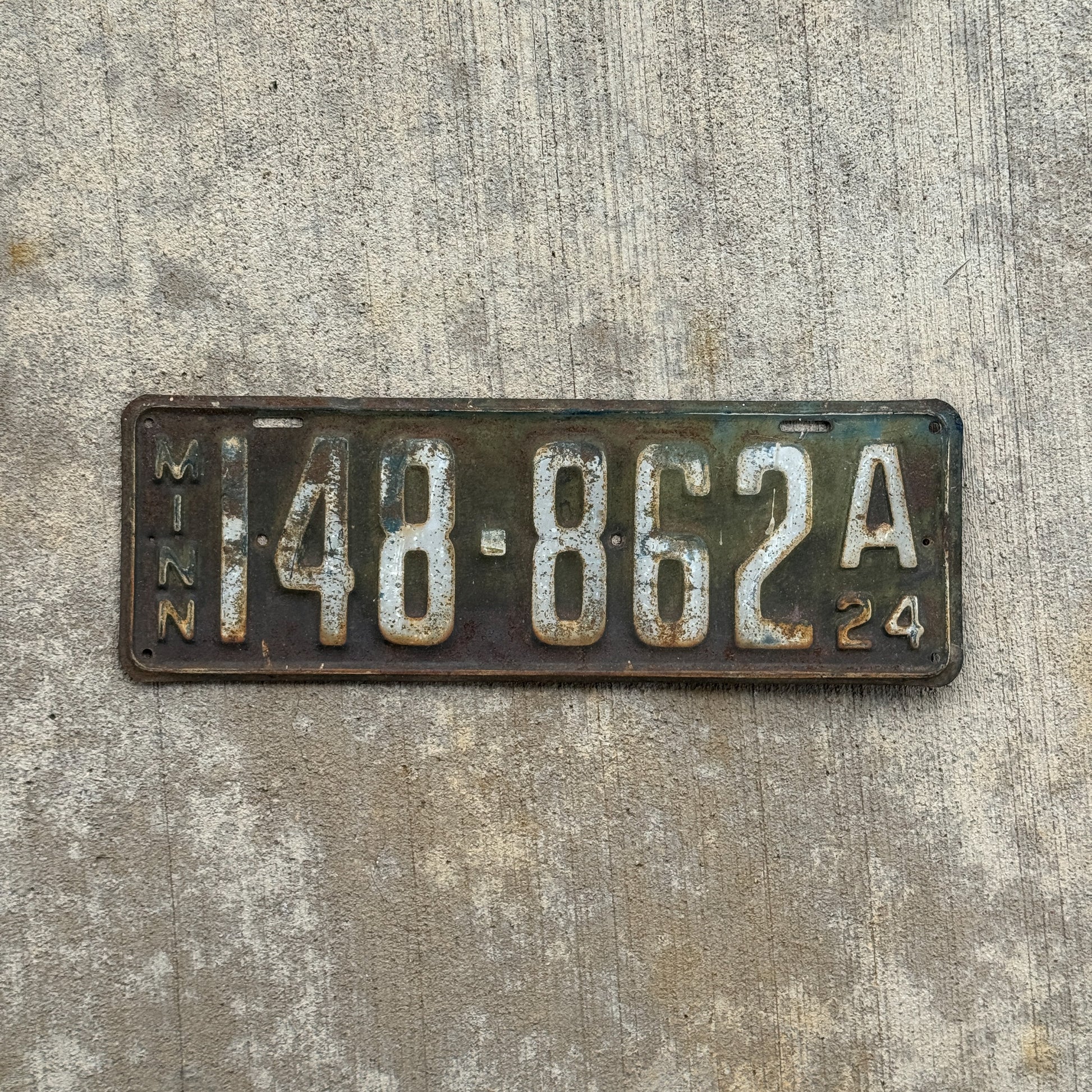 Photo of a 1924 Minnesota License Plate Auto Tag Garage Decor Vintage 148 862 A with original patina