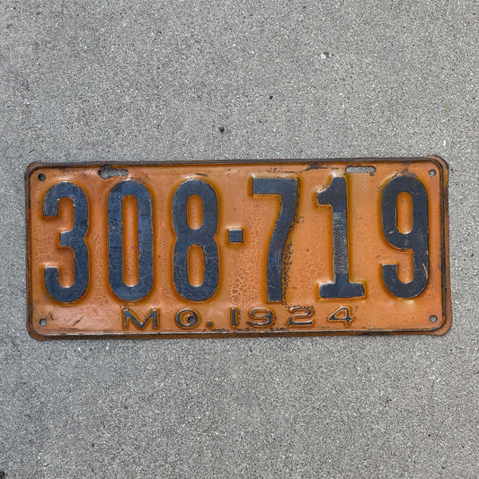 Photo of a 1924 Missouri License Plate Auto Tag Garage Decor Vintage 308 719 with original patina