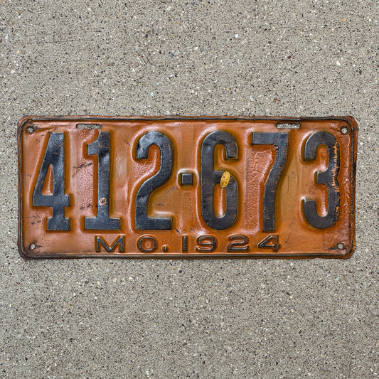 Photo of a 1924 Missouri License Plate Auto Tag Garage Decor Vintage 412 673 with original patina