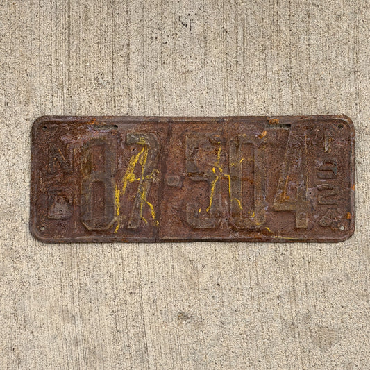 Photo of a 1924 North Dakota License Plate Auto Tag Garage Decor Vintage 87 504 with original patina