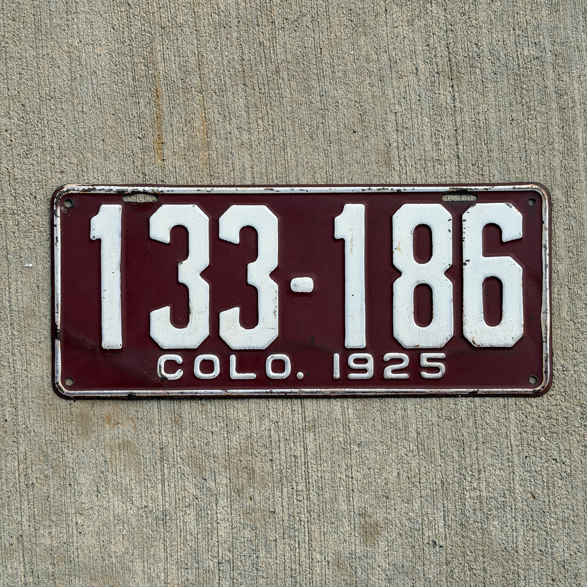 Photo of a 1925 Colorado License Plate Auto Tag Garage Decor Vintage 133 186 with original patina