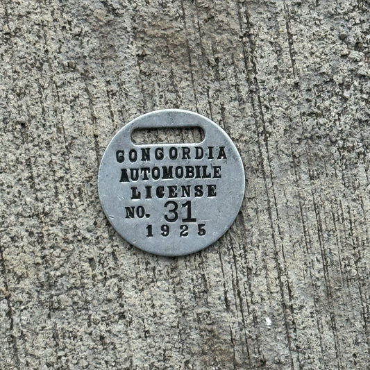 Photo of a 1925 Concordia Missouri Tax Tag Auto Tag Garage Decor Vintage Kansas New Jersey 31 with original patina